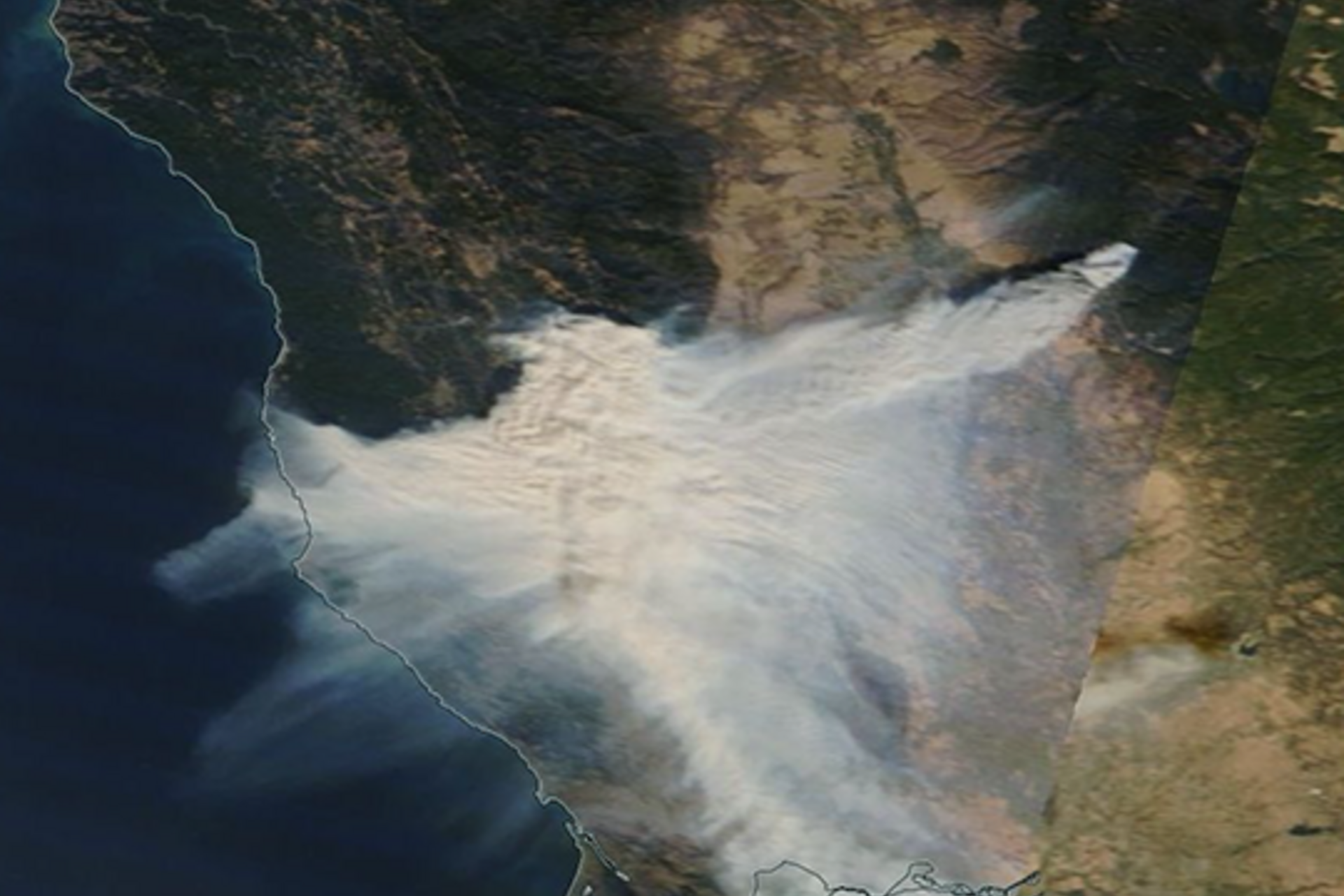 Aerial view of 2018 fire that killed at least 86 people and destroyed the town of Paradise, Ca., that PG&E is suspected to have started through lapsed maintenance of power lines.