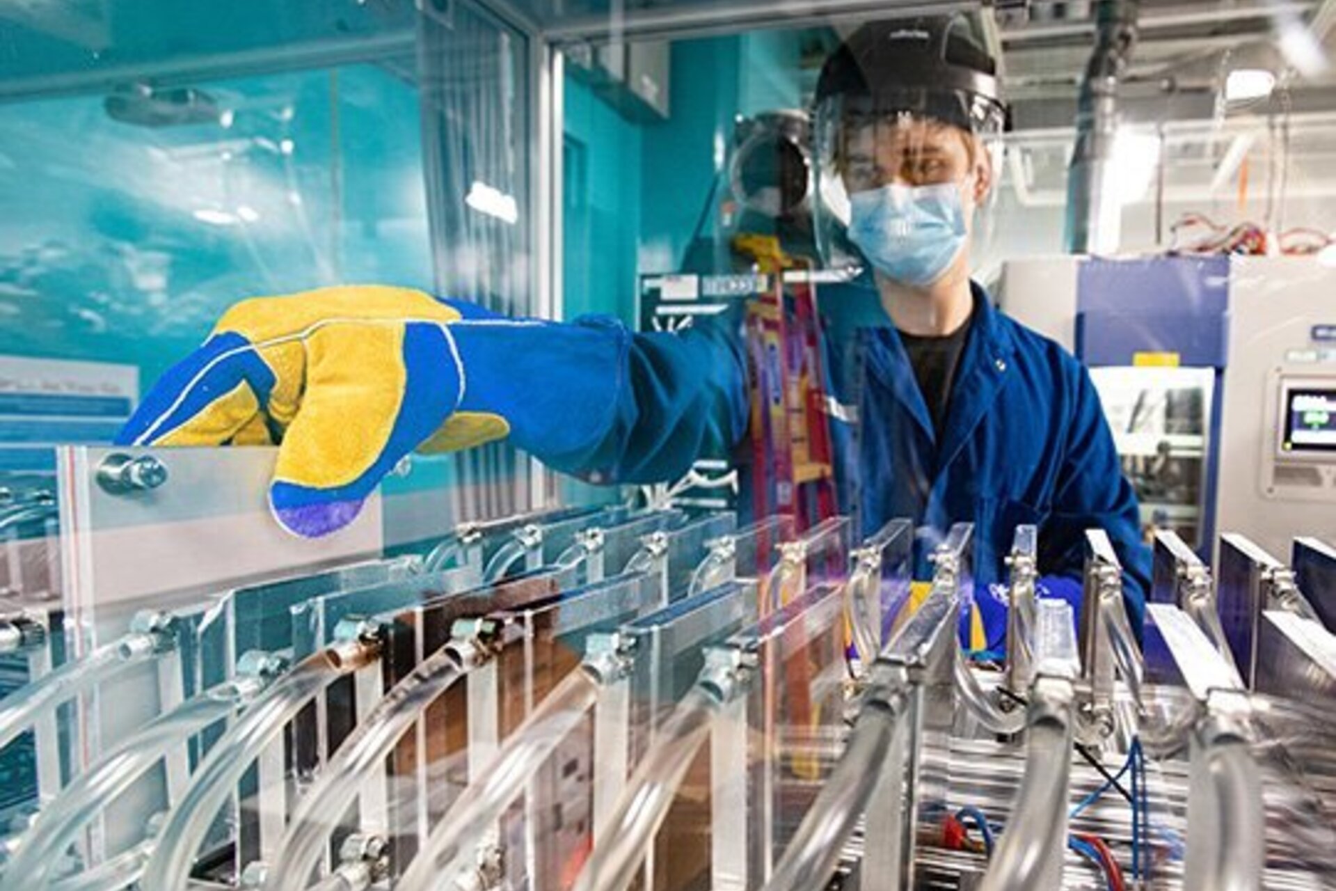 Staff engineer Bruis Van Vlijmen demonstrates how he works in the Battery Informatics Lab at SLAC