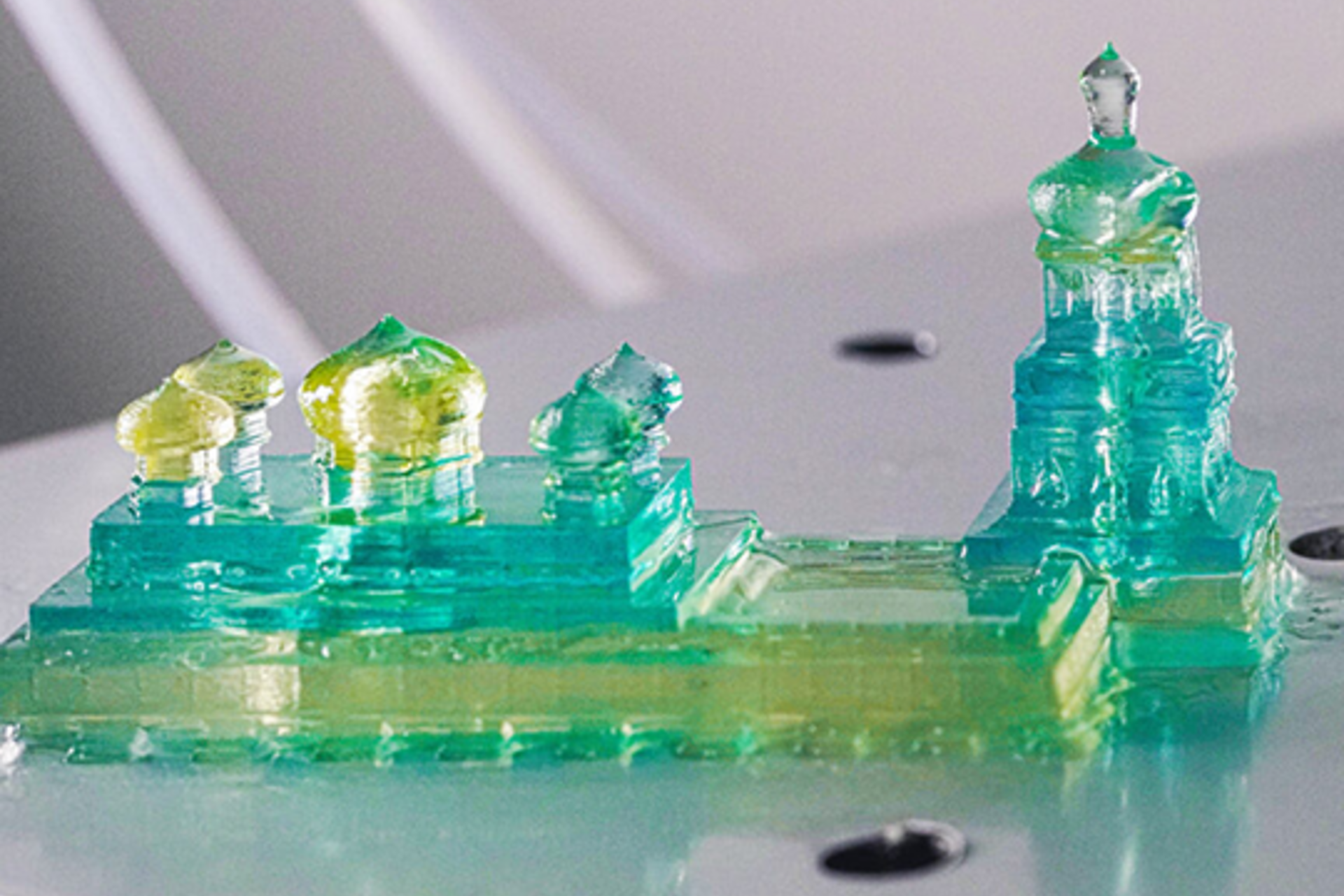 A model of Kyiv’s Saint Sophia Cathedral in the blue and yellow of the Ukrainian flag, made using the iCLIP method for 3D printing, which allows for the use of multiple types – or colors – of resin in a single object.
