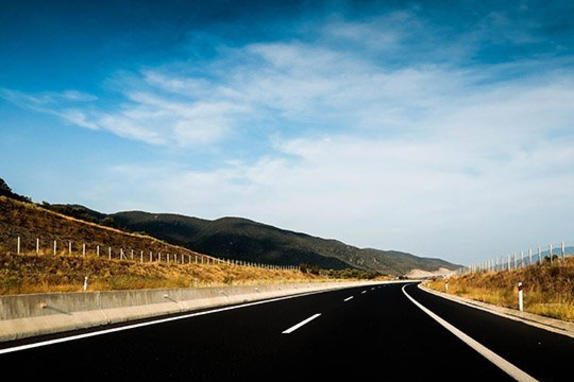 An empty highway that looks freshly paved
