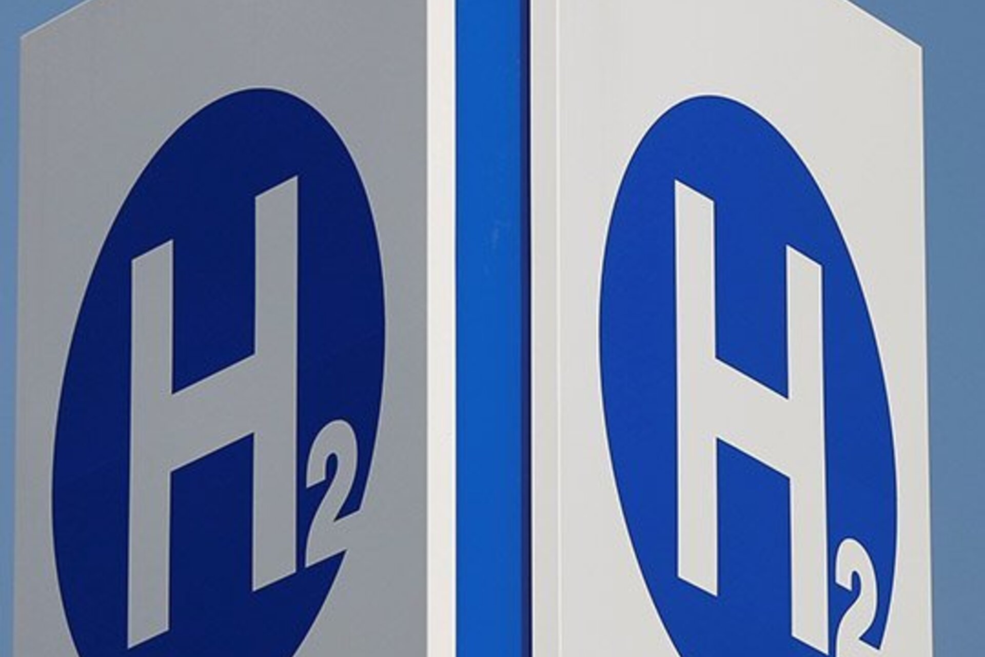 Hydrogen storage signs with "H2" inside a bright blue circle