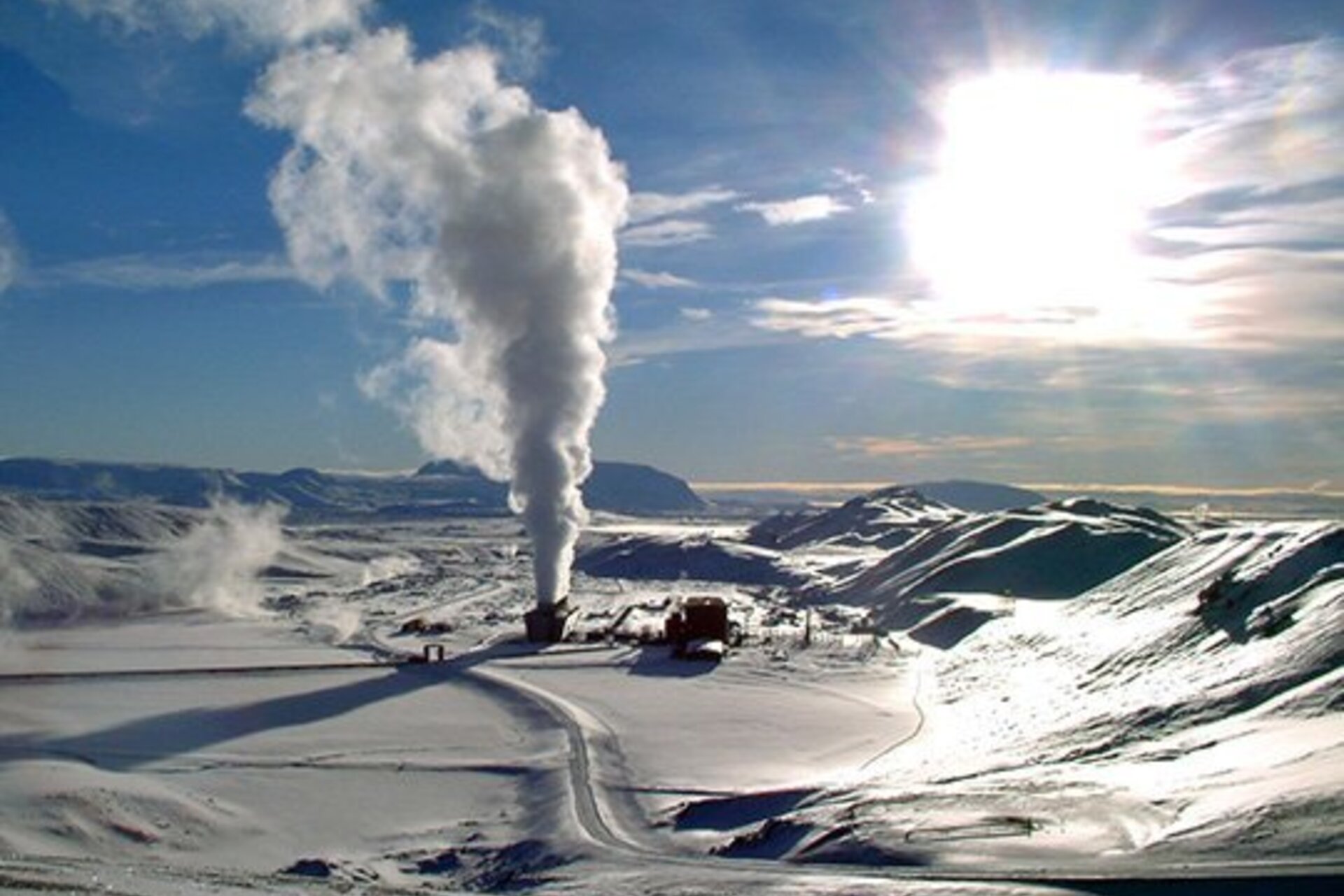 A geothermal power station in a snowy landscape