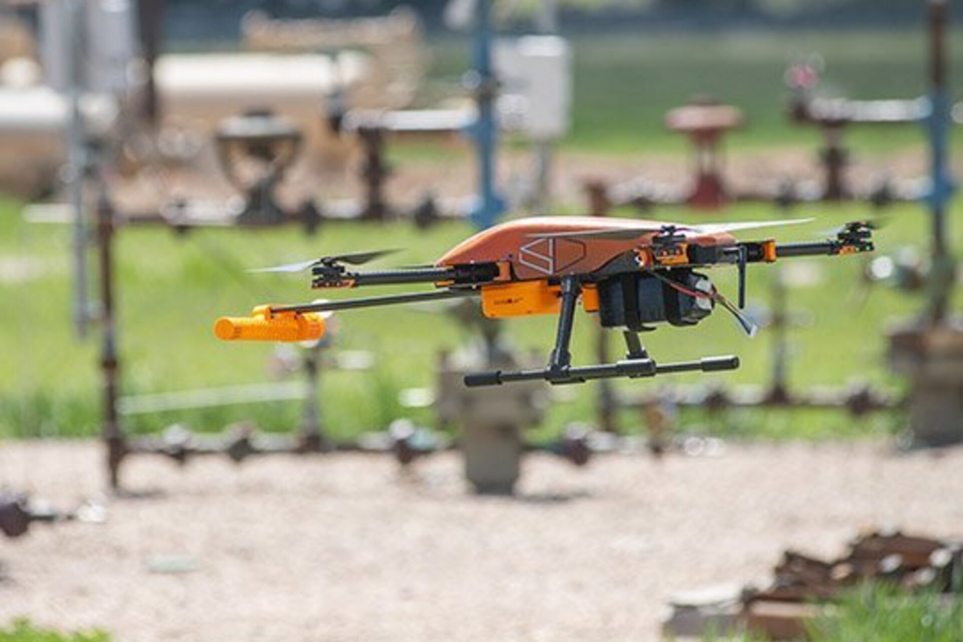 A drone floating somewhat close to the ground