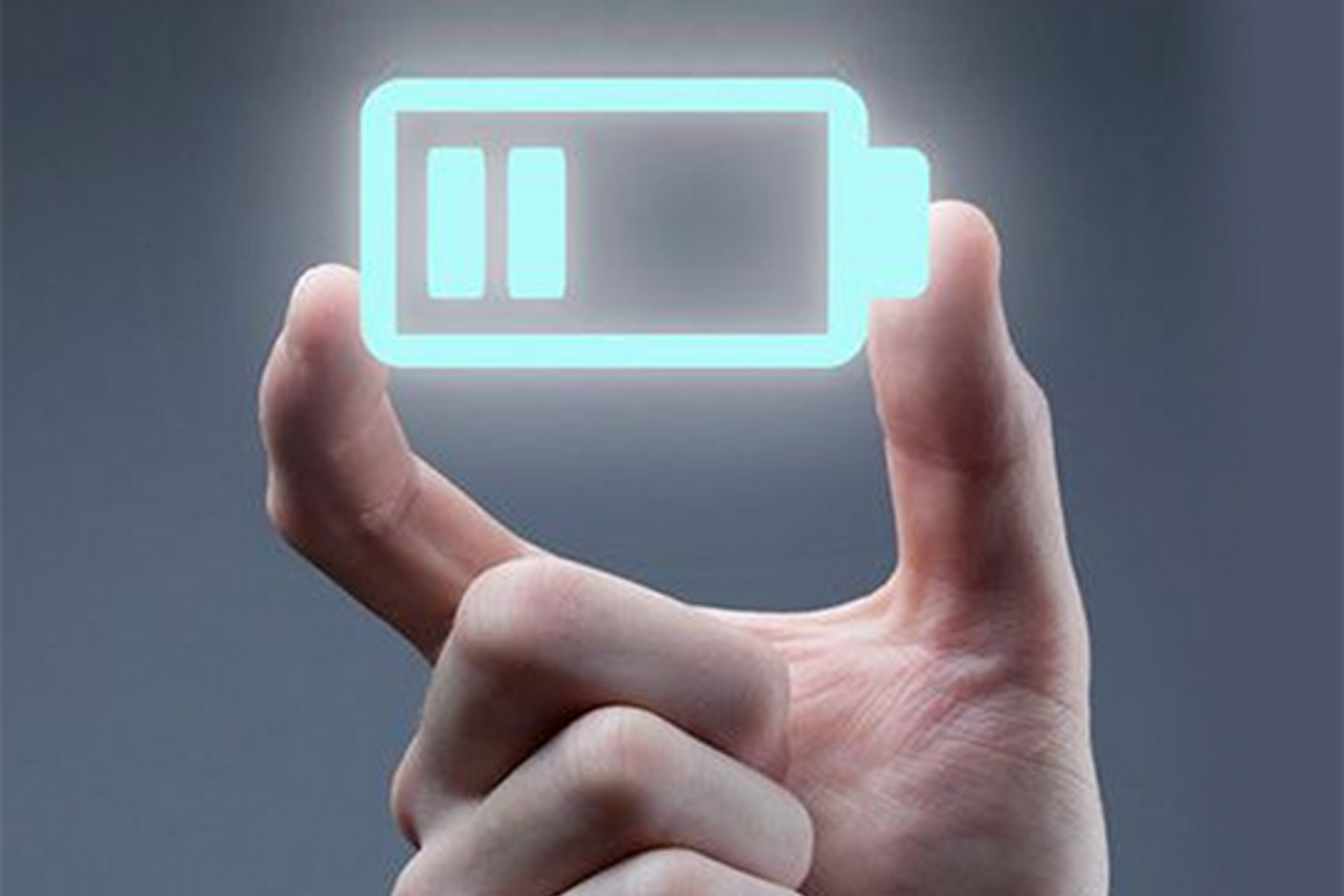 A hand holding a digital drawing of a light blue, glowing battery filled up a bit less than halfway