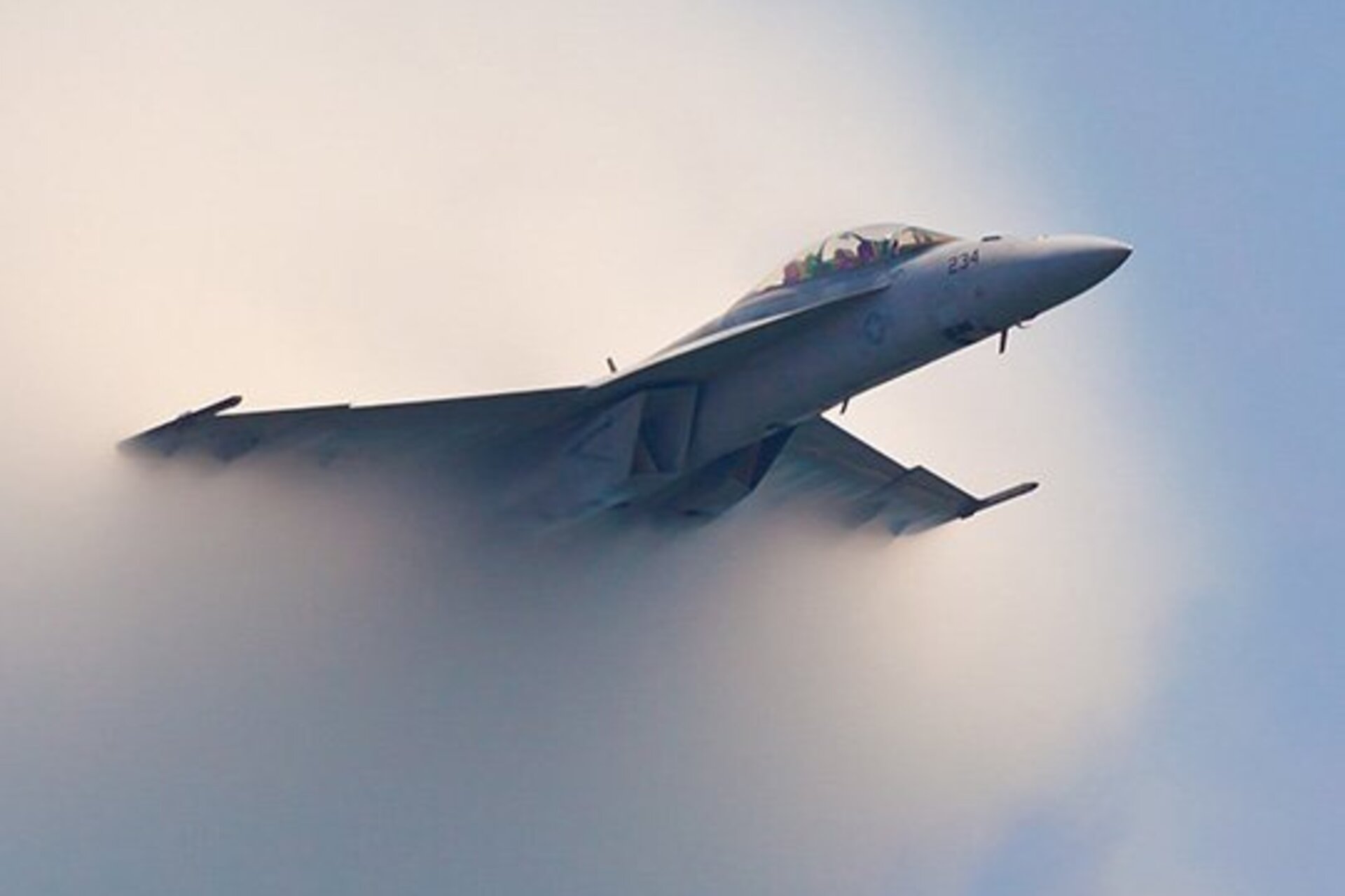 an F/A-18 Super Hornet flying at subsonic speed