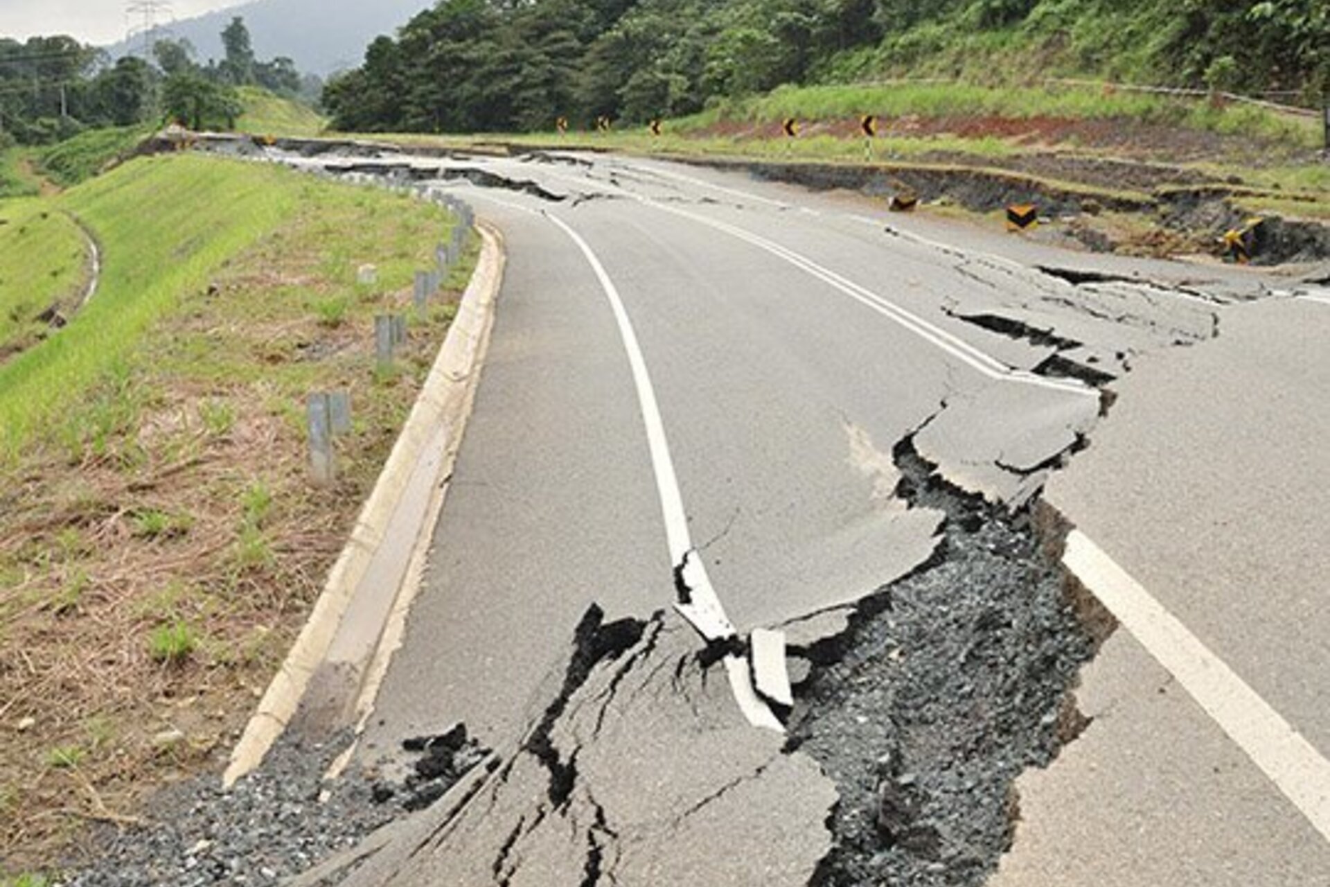 Earthquake damage to a stretch of road