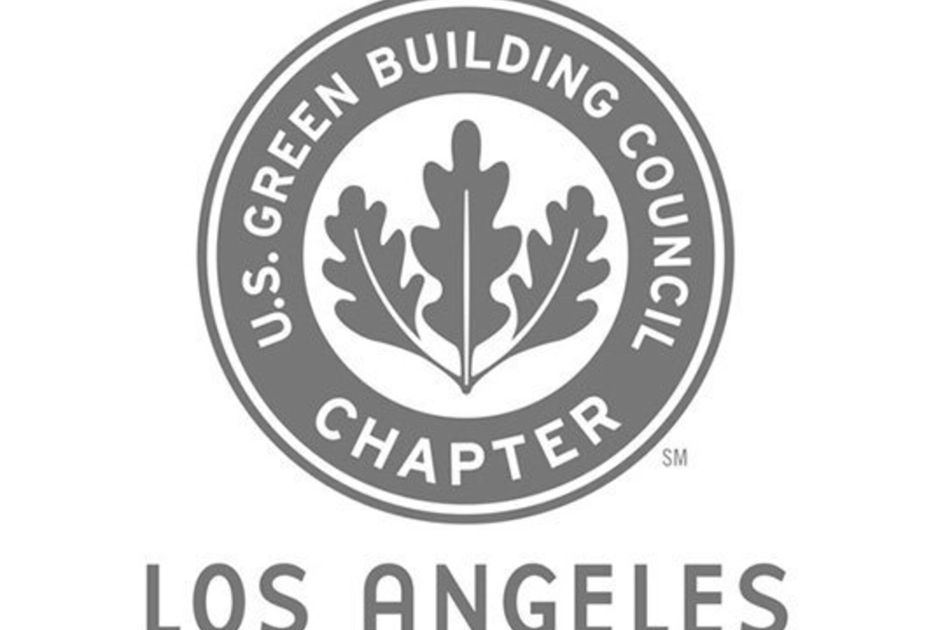 The seal of US Green Building Council Chapter Los Angeles with three joined leaves in the center