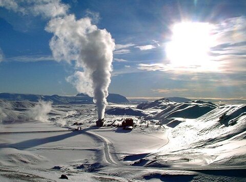 A geothermal power station in a snowy landscape