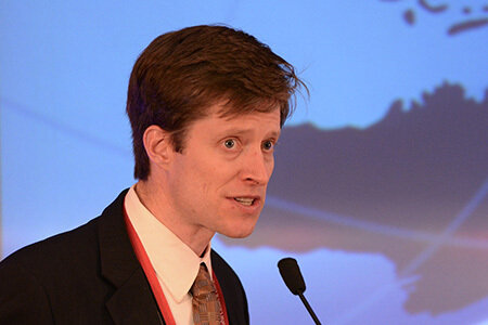 Mark Thurber speaks into a microphone