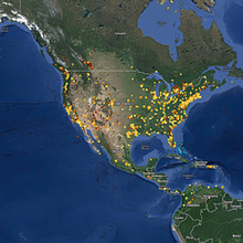 Map of North America in evening with spots for electricity usage